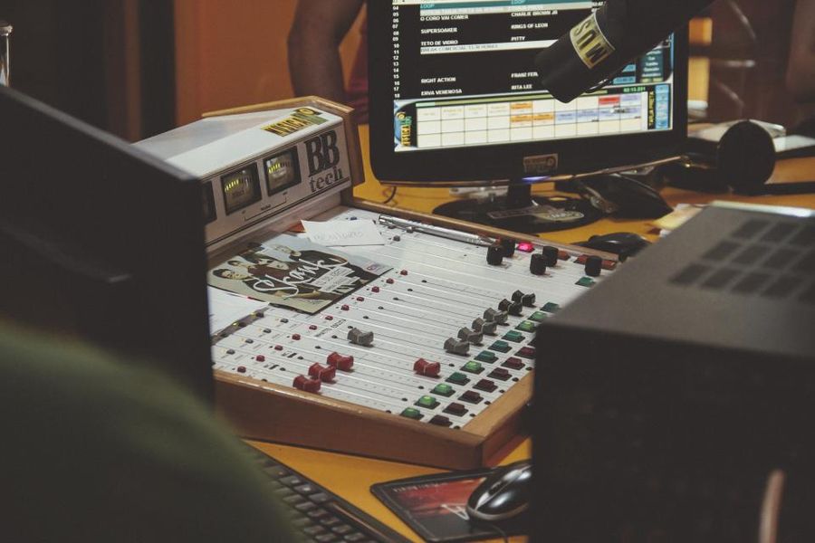 Audio mixing console with faders